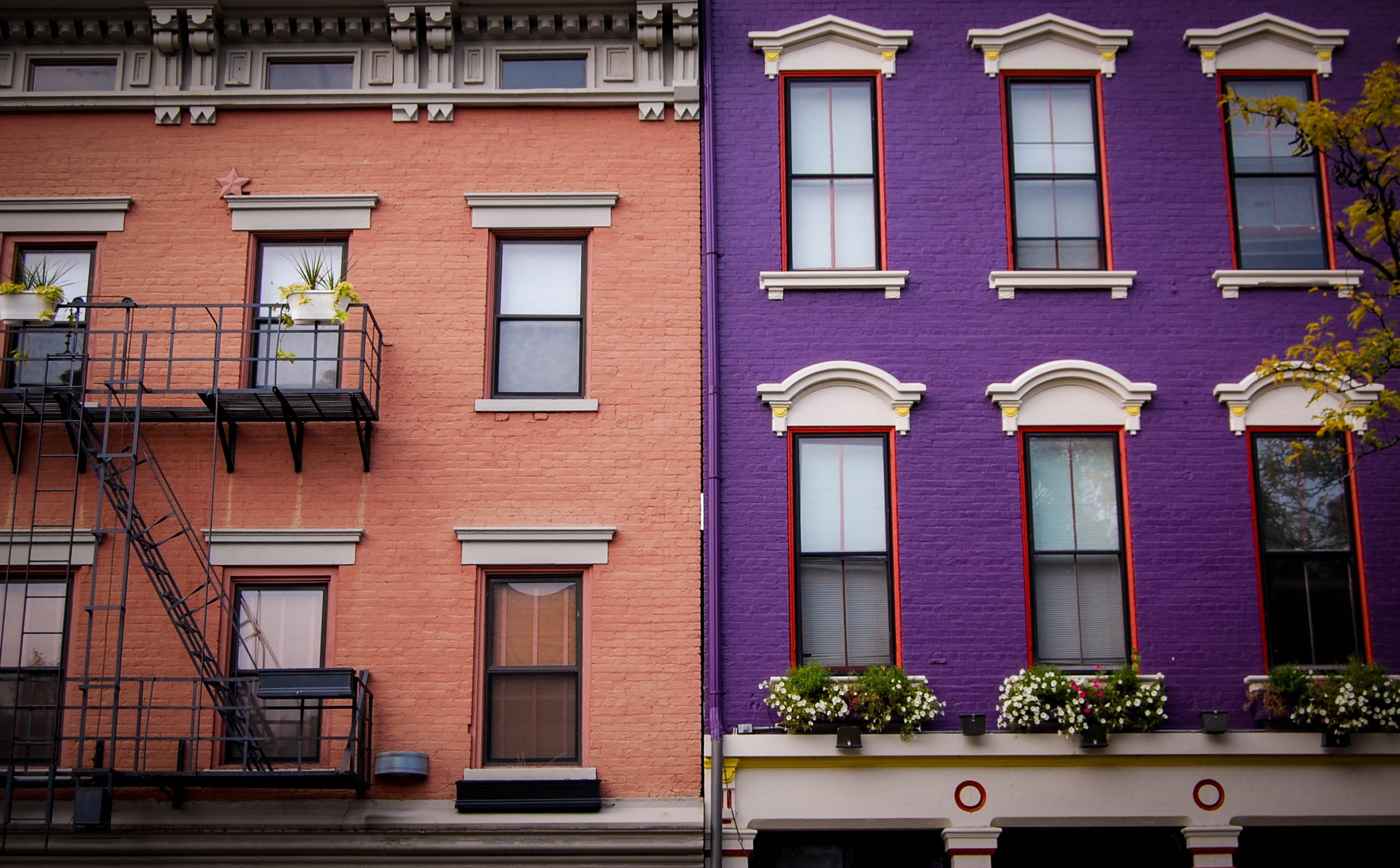 pink and purple italianate homes in over-the-rhine